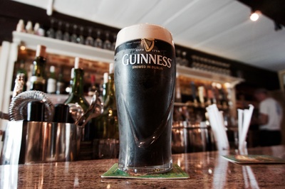 photo of a full glass of guinness at the pub inside Garvan's